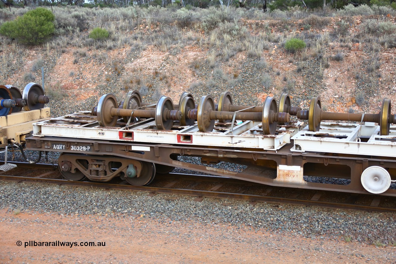 161116 5131
West Kalgoorlie, Shell fuel train 3442, container flat waggon AQWY 30329, built by Tomlinson Steel WA in a batch of 161 WFX type waggons between 1969 and 1970. Fitted with three 20' wheel set carrying frames.
Keywords: AQWY-type;AQWY30329;Tomlinson-Steel-WA;WFX-type;