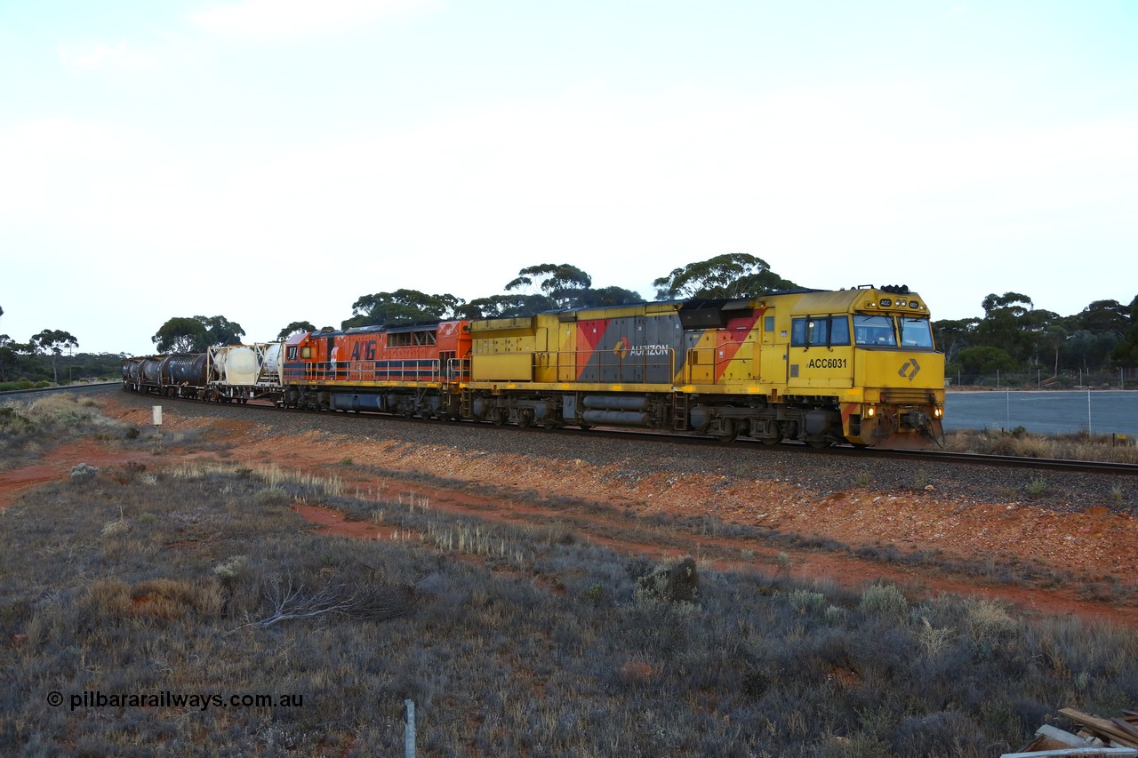 161116 5546
Binduli, empty Shell fuel train 4443 departs West Kalgoorlie behind UGL Rail built GE model C44ACi unit ACC 6031 serial R-0093-01 / 13-485 and Clyde Engineering built EMD model GT46C Q class unit Q 4009 (originally Q 309) serial 97-1461 with 17 waggons for 345 metres and 425 tonnes on the overnight run to Esperance.
Keywords: ACC-class;ACC6031;R-0093-01/13-485;UGL-Rail;GE;C44ACi;