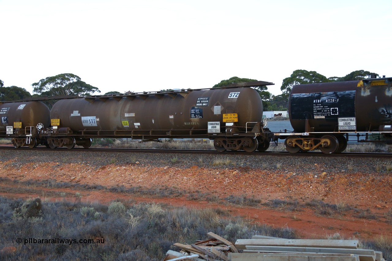 161116 5550
Binduli, empty Shell fuel train 4443, ATPF type tank waggon ATPF 572, built by WAGR Midland Workshops 1974 for Shell as WJP type 80.66 kL one compartment one dome, old code still visible, fitted with type F InterLock couplers.
Keywords: ATPF-type;ATPF572;WAGR-Midland-WS;WJP-type;