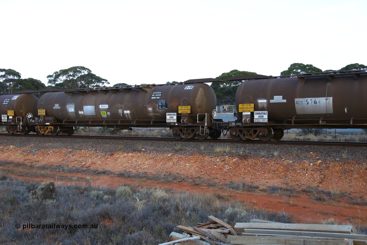 161116 5556
Binduli, empty Shell fuel train 4443, ATPF type fuel tank waggon ATPF 578, originally built by WAGR Midland Workshops in 1974 for Shell as type WJP 80.66 kL one compartment one dome, it also spent time in SA in 1985. Capacity now 80,350 litres, fitted with type F InterLock couplers.
Keywords: ATPF-type;ATPF578;WAGR-Midland-WS;WJP-type;