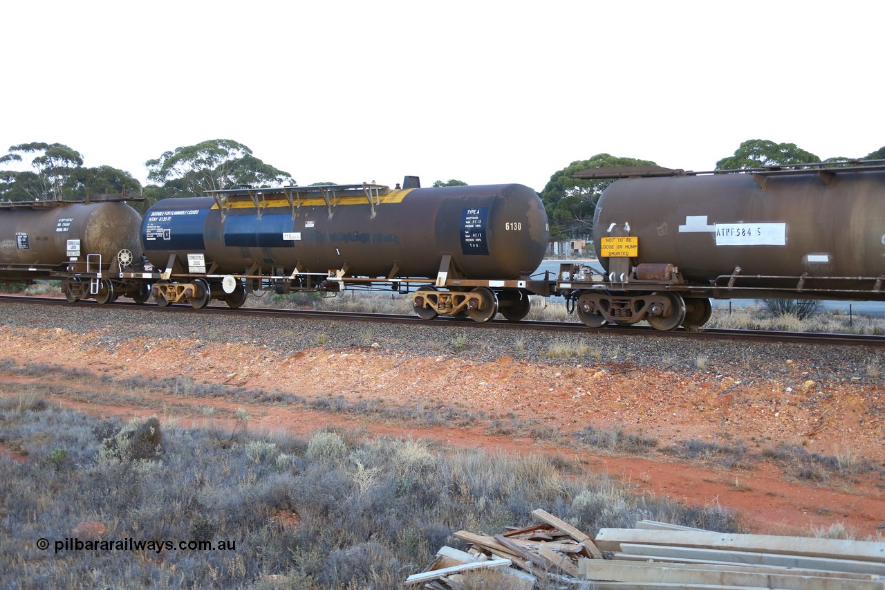 161116 5561
Binduli, empty Shell fuel train 4443, tank waggon NTAY 6130, built by Indeng Qld 1979 for Shell as type SCA 281, later NTAF 281.
Keywords: NTAY-type;NTAY6130;Indeng-Qld;SCA-type;SCA281;