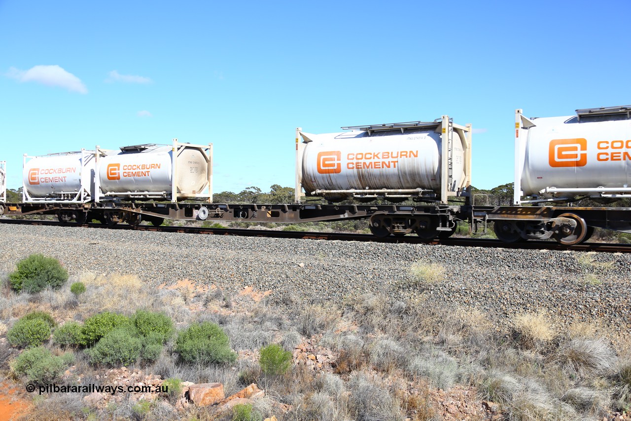 161111 2455
Binduli, Kalgoorlie Freighter train 5025, waggon AQWY 30226 loaded with two Cockburn Cement ITVU type 20' tanktainers IVTU 274014 and IVTU 274013. Waggon was originally built at Midland Workshops as a WFX type in a batch of forty five in 1974, later recoded to WQCX.
Keywords: AQWY-type;AQWY30226;WAGR-Midland-WS;WFX-type;