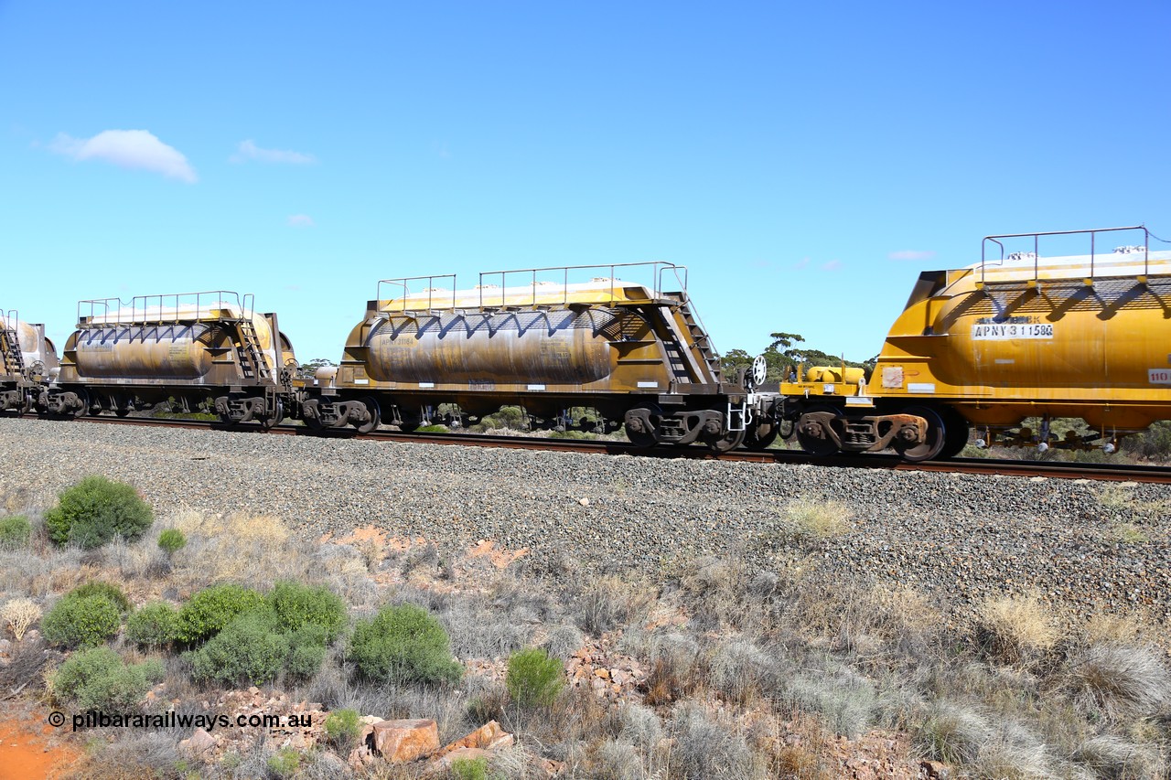 161111 2459
Binduli, Kalgoorlie Freighter train 5025, waggon APNY 31164, one of four built by Westrail Midland Workshops in 1978 as WNA type pneumatic discharge nickel concentrate waggon, WAGR built and owned copies of the AE Goodwin built WN waggons for WMC.
Keywords: APNY-type;APNY31164;Westrail-Midland-WS;WNA-type;