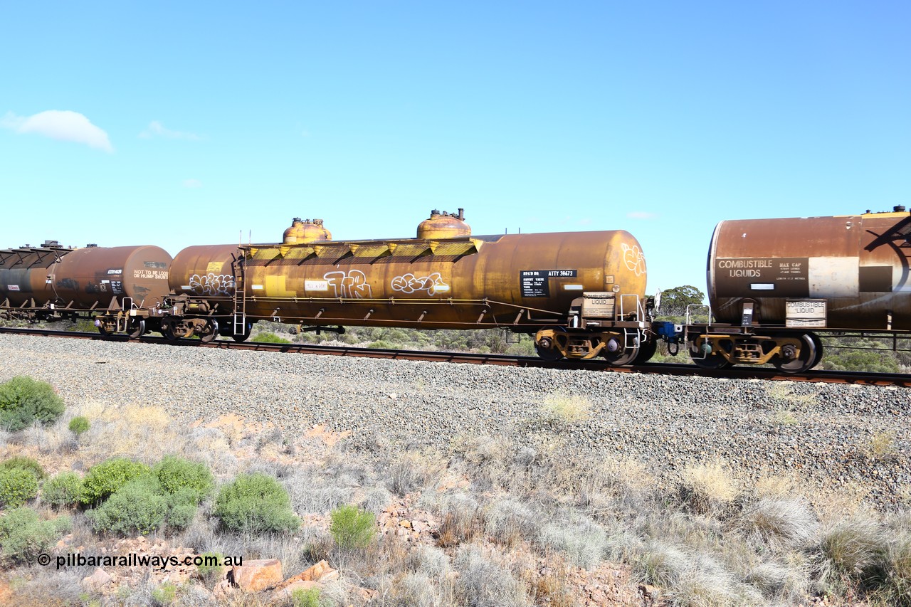161111 2471
Binduli, Kalgoorlie Freighter train 5025, diesel fuel tank waggon ATTY 30673, one of five built by AE Goodwin NSW in 1970 as WST class, recoded to WSTY and then ATTY. 78600 litre capacity.
Keywords: ATTY-type;ATTY30673;AE-Goodwin;WST-type;WSTY-type;
