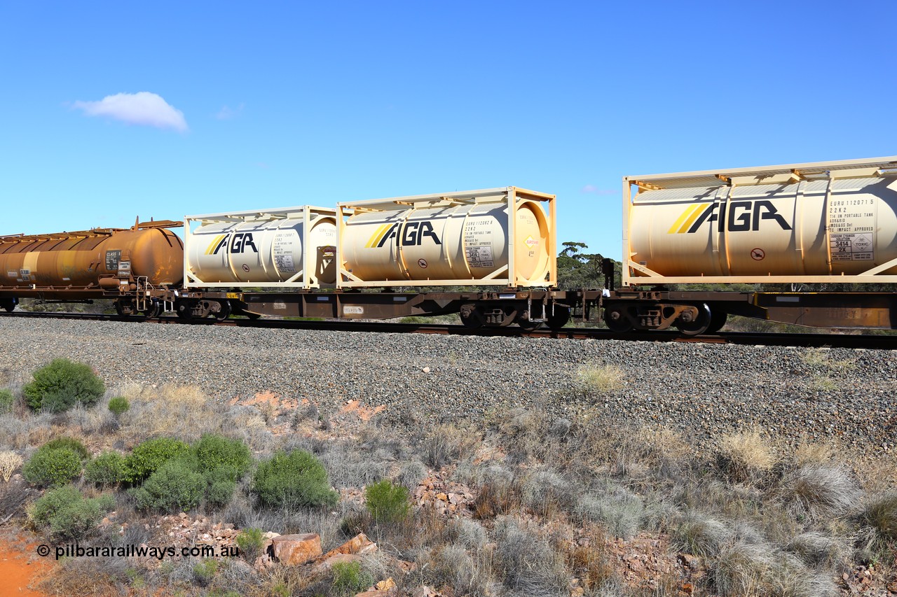 161111 2507
Binduli, Kalgoorlie Freighter train 5025, waggon AQNY 32186 one of sixty two waggons built by Goninan WA in 1998 as WQN type for Murrin Murrin container traffic, carrying two AGR 20' 22K2 type Eurotainer tanktainers EURU 112056 and EURU 112062 containing sodium cyanide solution.
Keywords: AQNY-type;AQNY32186;Goninan-WA;WQN-type;