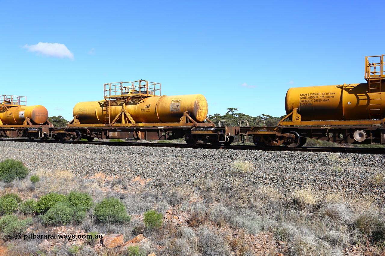 161111 2519
Binduli, Kalgoorlie Freighter train 5025, waggon AQHY 30089 with sulphuric acid tank CSA 0085, originally built by the WAGR Midland Workshops in 1964/66 as a WF type flat waggon, then in 1997, following several recodes and modifications, was one of seventy five waggons converted to the WQH type to carry CSA sulphuric acid tanks between Hampton/Kalgoorlie and Perth/Kwinana.
Keywords: AQHY-type;AQHY30089;WAGR-Midland-WS;WF-type;WFDY-type;WFDF-type;RFDF-type;WQH-type;