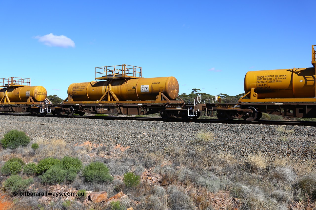 161111 2532
Binduli, Kalgoorlie Freighter train 5025, waggon AQHY 30006 with sulphuric acid tank CSA 0131, originally built by the WAGR Midland Workshops in 1964/66 as a WF type flat waggon, then in 1997, following several recodes and modifications, was one of seventy five waggons converted to the WQH type to carry CSA sulphuric acid tanks between Hampton/Kalgoorlie and Perth/Kwinana.
Keywords: AQHY-type;AQHY30006;WAGR-Midland-WS;WF-type;WMA-type;WFDY-type;WFDF-type;RFDF-type;WQH-type;