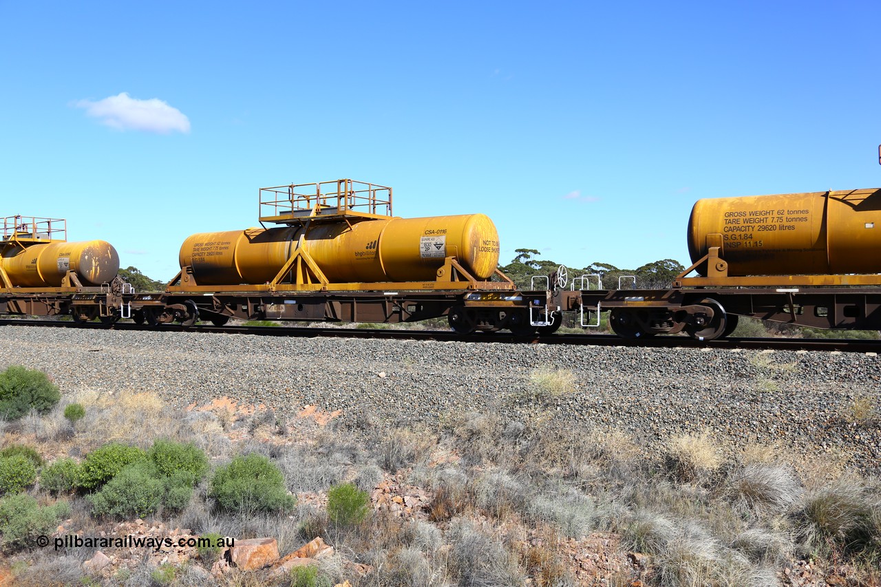 161111 2533
Binduli, Kalgoorlie Freighter train 5025, waggon AQHY 30077 with sulphuric acid tank CSA 0116, originally built by the WAGR Midland Workshops in 1964/66 as a WF type flat waggon, then in 1997, following several recodes and modifications, was one of seventy five waggons converted to the WQH type to carry CSA sulphuric acid tanks between Hampton/Kalgoorlie and Perth/Kwinana.
Keywords: AQHY-type;AQHY30077;WAGR-Midland-WS;WF-type;WFDY-type;WFDF-type;RFDF-type;WQH-type;
