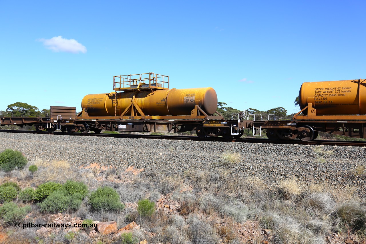 161111 2537
Binduli, Kalgoorlie Freighter train 5025, waggon AQHY 30062 with sulphuric acid tank CSA 0123, originally built by the WAGR Midland Workshops in 1964/66 as a WF type flat waggon, then in 1997, following several recodes and modifications, was one of seventy five waggons converted to the WQH type to carry CSA sulphuric acid tanks between Hampton/Kalgoorlie and Perth/Kwinana.
Keywords: AQHY-type;AQHY30062;WAGR-Midland-WS;WF-type;WFDY-type;WFDF-type;RFDF-type;WQH-type;