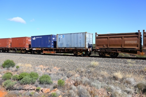 161111 2490
Binduli, Kalgoorlie Freighter train 5025, waggon AQRY 1013 platform A, with two 20' 22G1 type boxes, MOL MOAU 580920[7] and Cronos CXDU 158872[8]. The AQRY are a bar-coupled pair and were used for rail transport as the AFRF type on the Darwin line and are originally former ANR-CR waggons.
Keywords: AQRY-type;AQRY1013;AFRF-type;