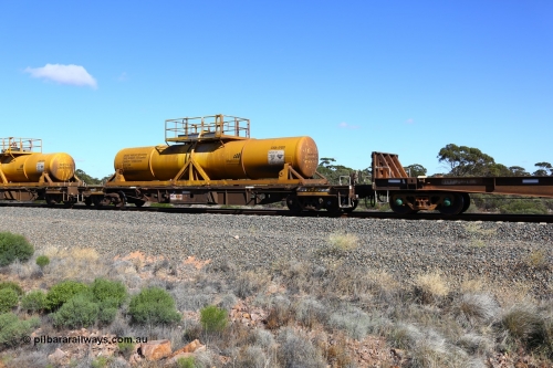 161111 2517
Binduli, Kalgoorlie Freighter train 5025, waggon AQHY 30012 with sulphuric acid tank CSA 0120, originally built by the WAGR Midland Workshops in 1964/66 as a WF type flat waggon, then in 1997, following several recodes and modifications, was one of seventy five waggons converted to the WQH type to carry CSA sulphuric acid tanks between Hampton/Kalgoorlie and Perth/Kwinana.
Keywords: AQHY-type;AQHY30012;WAGR-Midland-WS;WF-type;WMA-type;WFDY-type;WFDF-type;RFDF-type;WQH-type;