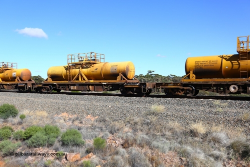 161111 2519
Binduli, Kalgoorlie Freighter train 5025, waggon AQHY 30089 with sulphuric acid tank CSA 0085, originally built by the WAGR Midland Workshops in 1964/66 as a WF type flat waggon, then in 1997, following several recodes and modifications, was one of seventy five waggons converted to the WQH type to carry CSA sulphuric acid tanks between Hampton/Kalgoorlie and Perth/Kwinana.
Keywords: AQHY-type;AQHY30089;WAGR-Midland-WS;WF-type;WFDY-type;WFDF-type;RFDF-type;WQH-type;