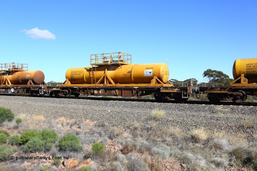 161111 2535
Binduli, Kalgoorlie Freighter train 5025, waggon AQHY 30020 with sulphuric acid tank CSA 0115, originally built by the WAGR Midland Workshops in 1964/66 as a WF type flat waggon, then in 1997, following several recodes and modifications, was one of seventy five waggons converted to the WQH type to carry CSA sulphuric acid tanks between Hampton/Kalgoorlie and Perth/Kwinana.
Keywords: AQHY-type;AQHY30020;WAGR-Midland-WS;WF-type;WFDY-type;WFDF-type;WQH-type;