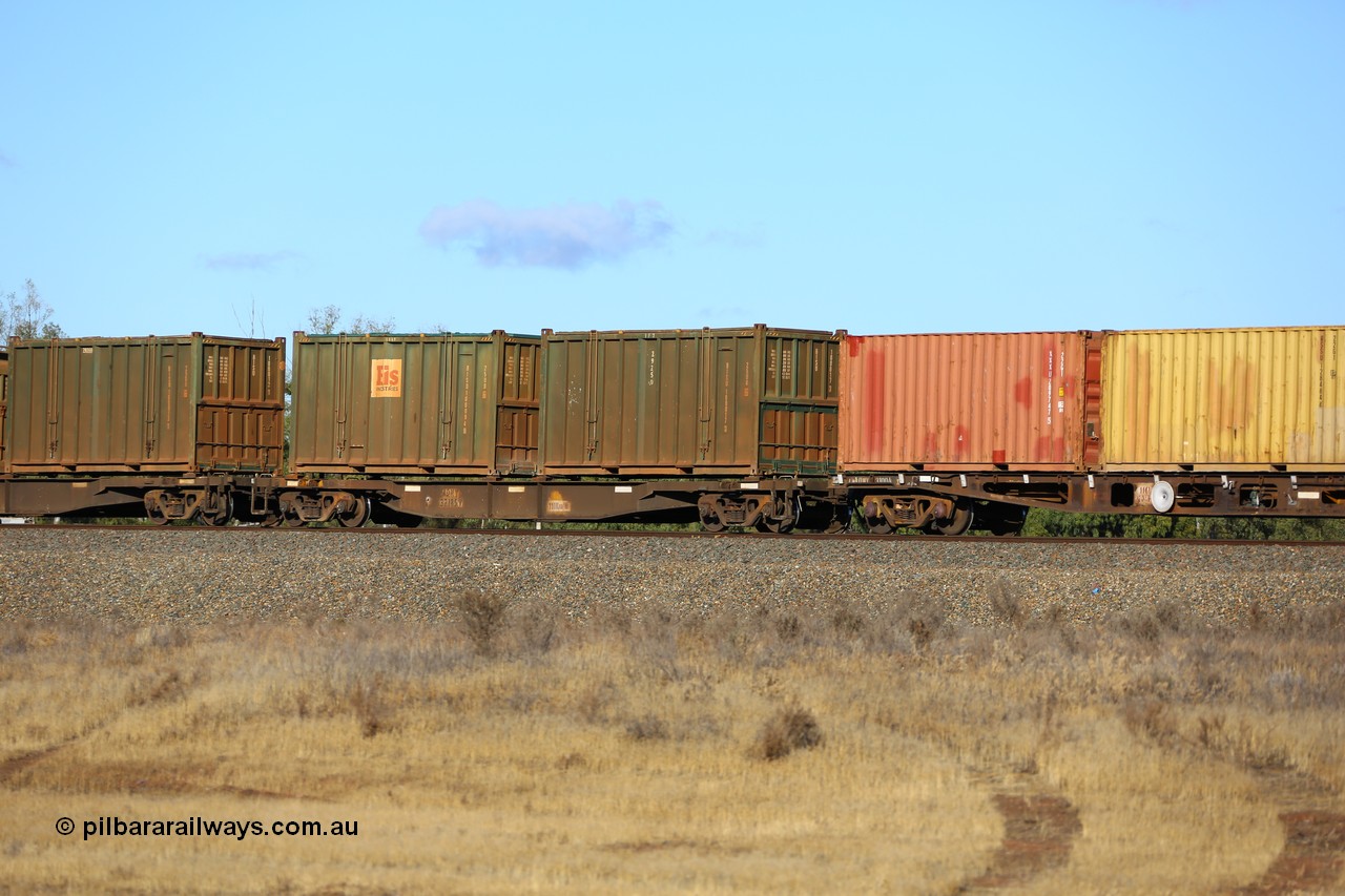 161111 2417
Kalgoorlie, Malcolm freighter train 5029, waggon AQNY 32185 one of sixty two waggons built by Goninan WA in 1998 as WQN type for Murrin Murrin container traffic with two Bis Industries hard-top 25U0 type sulphur containers, undecorated BISU 100017 and decaled BISU 100094.
Keywords: AQNY-type;AQNY32185;Goninan-WA;WQN-type;