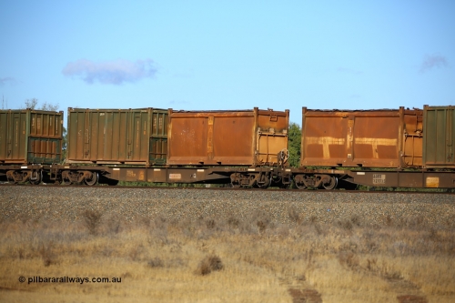 161111 2408
Kalgoorlie, Malcolm freighter train 5029, waggon AQNY 32172 one of sixty two waggons built by Goninan WA in 1998 as WQN type for Murrin Murrin container traffic with an original style sulphur container S11N 911 with original style door and sliding tarpaulin and a Bis Industries hard-top 25U0 type sulphur container BISU 100063.
Keywords: AQNY-type;AQNY32172;Goninan-WA;WQN-type;