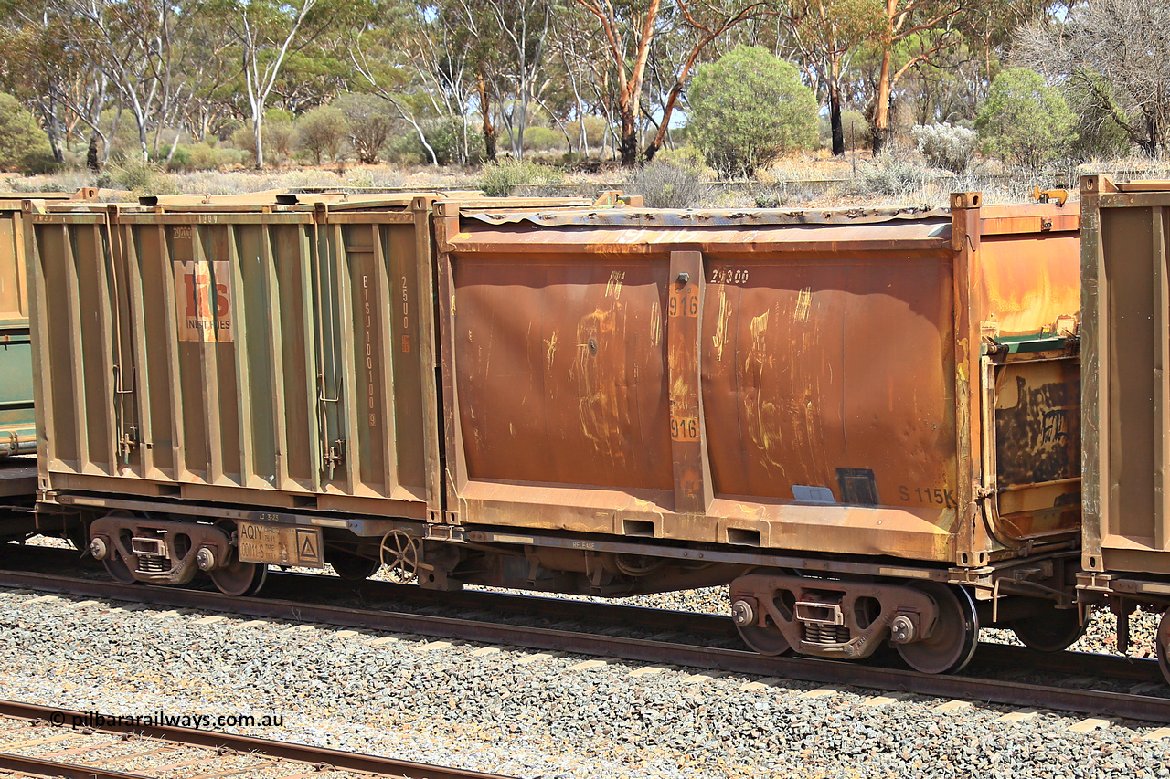 231020 8275
Binduli, 5029 Malcolm Freighter, AQIY type 40' container waggon AQIY 00011 with an original style sulphur container S115K G916 and a Bis Industries hard-top 25U0 type sulphur containers BISU 100100. The AQIY started life built by Bradken and coded CQYY but CFCLA never bought them, so Bradken coded them KQYY and stored them. When Aurizon bought them they had the handbrake relocated to the middle of the waggon from the end.
Keywords: AQIY-type;AQIY00011;Bradken;CQYY-type;KQYY-type;