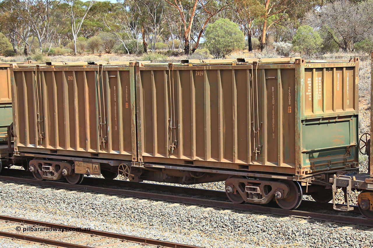 231020 8277
Binduli, 5029 Malcolm Freighter, AQIY type 40' container waggon AQIY 00005 with two undecorated Bis Industries hard-top 25U0 type sulphur containers BISU 100051 and BISU 100041. The AQIY started life built by Bradken and coded CQYY but CFCLA never bought them, so Bradken coded them KQYY and stored them. When Aurizon bought them they had the handbrake relocated to the middle of the waggon from the end.
Keywords: AQIY-type;AQIY00004;Bradken;CQYY-type;KQYY-type;