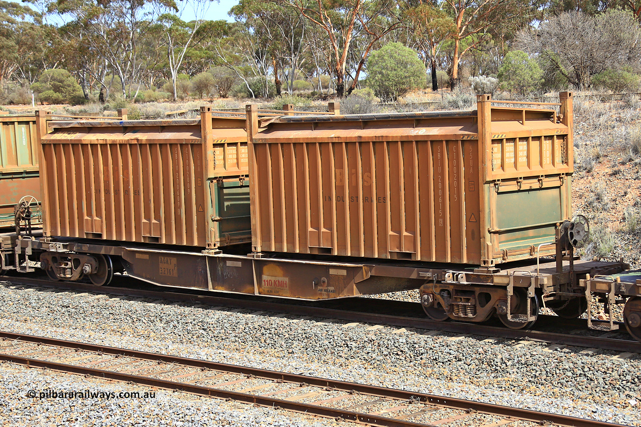 231020 8279
Binduli, 5029 Malcolm Freighter, AQNY type container waggon AQNY 32161 one of sixty two waggons built by Goninan WA in 1998 as WQN type for Murrin Murrin container traffic with two Bis Industries 55UA type roll-top sulphur containers SIBU 200615 and SIBU 200609.
Keywords: AQNY-type;AQNY32161;Goninan-WA;WQN-type;