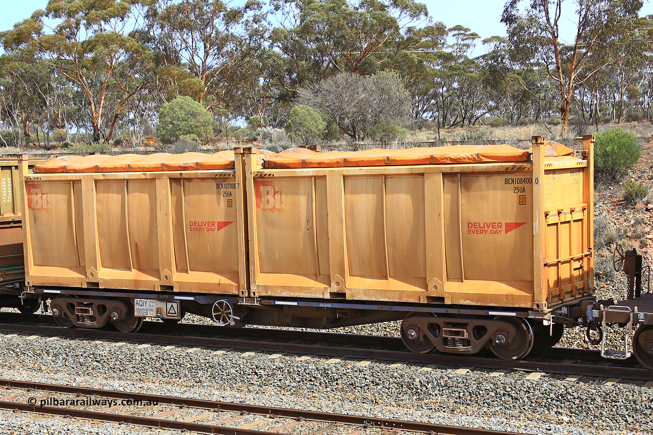 231020 8287
Binduli, 5029 Malcolm Freighter, AQIY type 40' container waggon AQIY 00017 with two Bis Deliver Every Day roll-top 25UA type sulphur containers BICN 108400 and BICN 107000. The AQIY started life built by Bradken and coded CQYY but CFCLA never bought them, so Bradken coded them KQYY and stored them. When Aurizon bought them they had the handbrake relocated to the middle of the waggon from the end.
Keywords: AQIY-type;AQIY00017;Bradken;CQYY-type;KQYY-type;