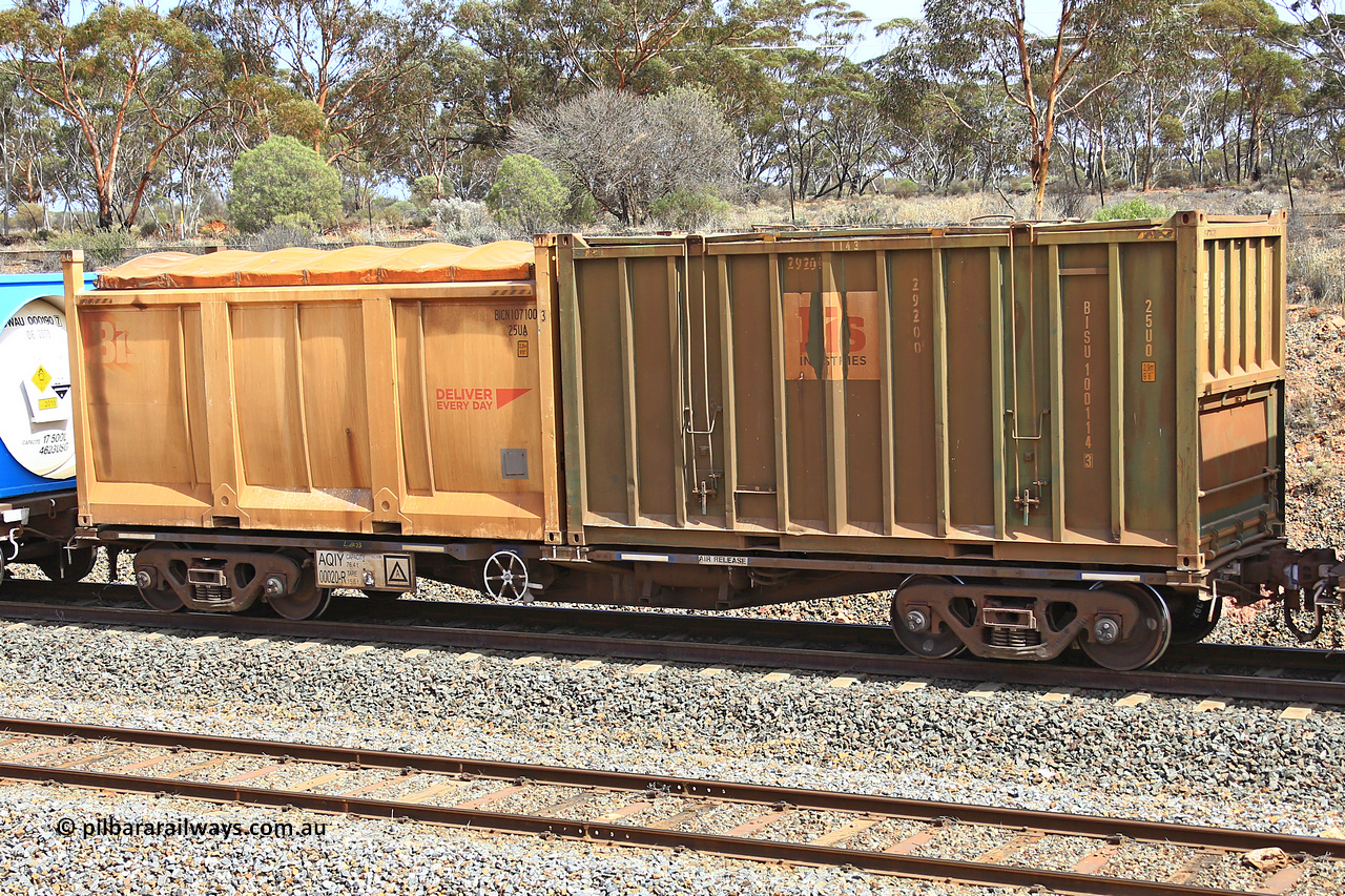 231020 8288
Binduli, 5029 Malcolm Freighter, AQIY type 40' container waggon AQIY 00020 with a Bis Industries hard-top 25U0 type sulphur container BISU 100114 and a Bis Deliver Every Day roll-top 25UA type sulphur containers BICN 107100. The AQIY started life built by Bradken and coded CQYY but CFCLA never bought them, so Bradken coded them KQYY and stored them. When Aurizon bought them they had the handbrake relocated to the middle of the waggon from the end.
Keywords: AQIY-type;AQIY00020;Bradken;CQYY-type;KQYY-type;