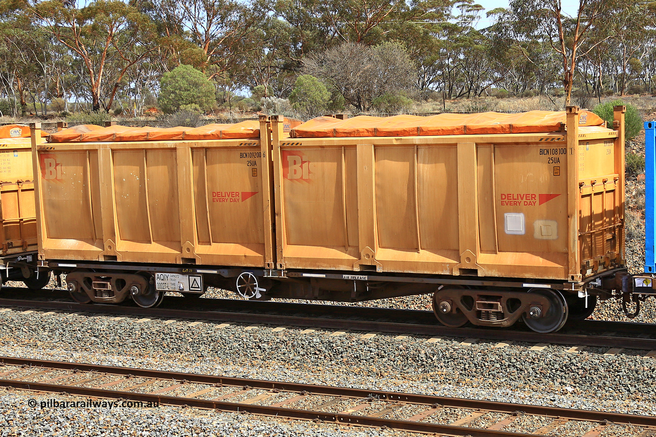 231020 8292
Binduli, 5029 Malcolm Freighter, AQIY type 40' container waggon AQIY 00027 with two Bis Deliver Every Day roll-top 25UA type sulphur containers BICN 108100 and BICN 109200. The AQIY started life built by Bradken and coded CQYY but CFCLA never bought them, so Bradken coded them KQYY and stored them. When Aurizon bought them they had the handbrake relocated to the middle of the waggon from the end.
Keywords: AQIY-type;AQIY00027;Bradken;CQYY-type;KQYY-type;