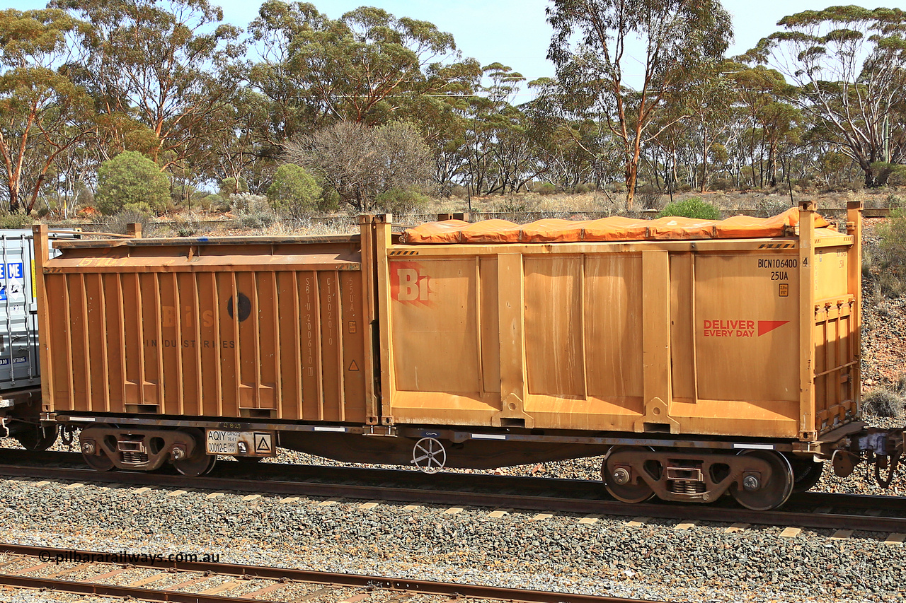 231020 8295
Binduli, 5029 Malcolm Freighter, AQIY type 40' container waggon AQIY 00012 with a Bis Deliver Every Day roll-top 25UA type sulphur container BICN 106400 and a Bis Industries roll-top 55UA type container SIBU 200610. The AQIY started life built by Bradken and coded CQYY but CFCLA never bought them, so Bradken coded them KQYY and stored them. When Aurizon bought them they had the handbrake relocated to the middle of the waggon from the end.
Keywords: AQIY-type;AQIY00012;Bradken;CQYY-type;KQYY-type;