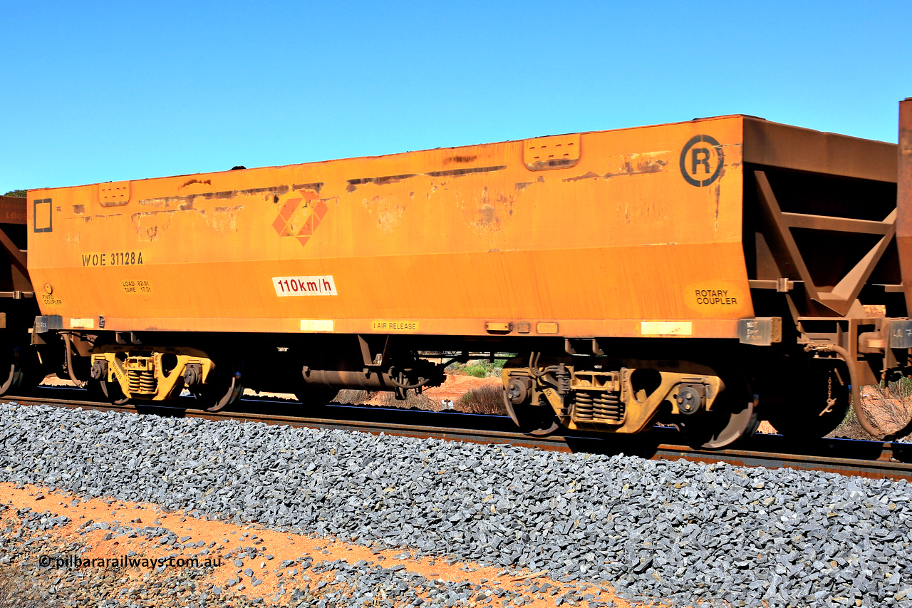 240328 2837
WOE type iron ore waggon WOE 31128 is one of a batch of one hundred and thirty built by Goninan WA between March and August 2001 with serial number 950092-118 and was fleet number 710 before the Aurizon yellow painted sides and logo, in Mineral Resources traffic 5040 empty Mount Walton iron ore train. March 28, 2024.
Keywords: WOE-type;WOE31128;Goninan-WA;950092-118;