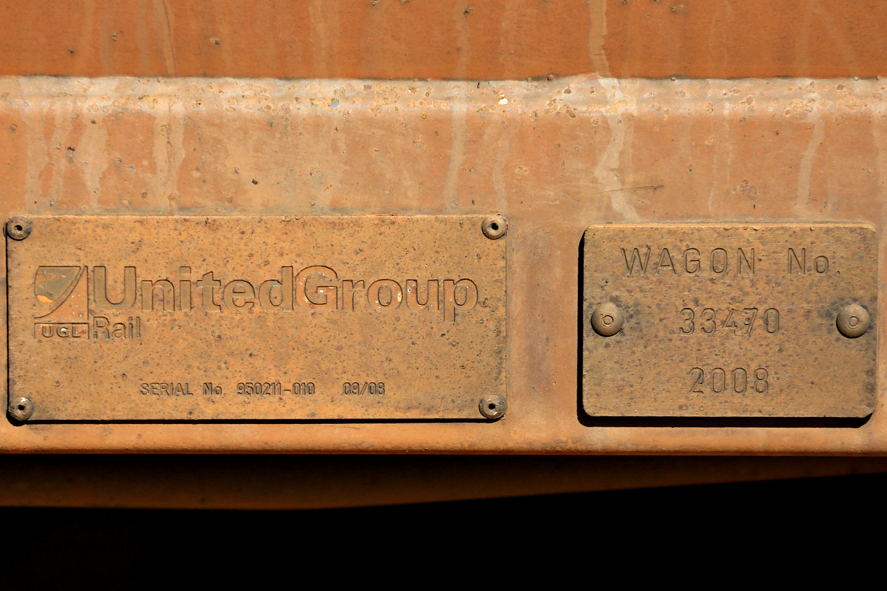 240328 2885
Builders plate for WOE type iron ore waggon WOE 33470 which is one of a batch of one hundred and twenty eight built by United Group Rail WA between August 2008 and March 2009 with serial number 950211-012 and fleet number 8970, in Mineral Resources traffic 5040 empty Mount Walton iron ore train. March 28, 2024.
Keywords: WOE-type;WOE33470;United-Group-Rail-WA;950211-012;