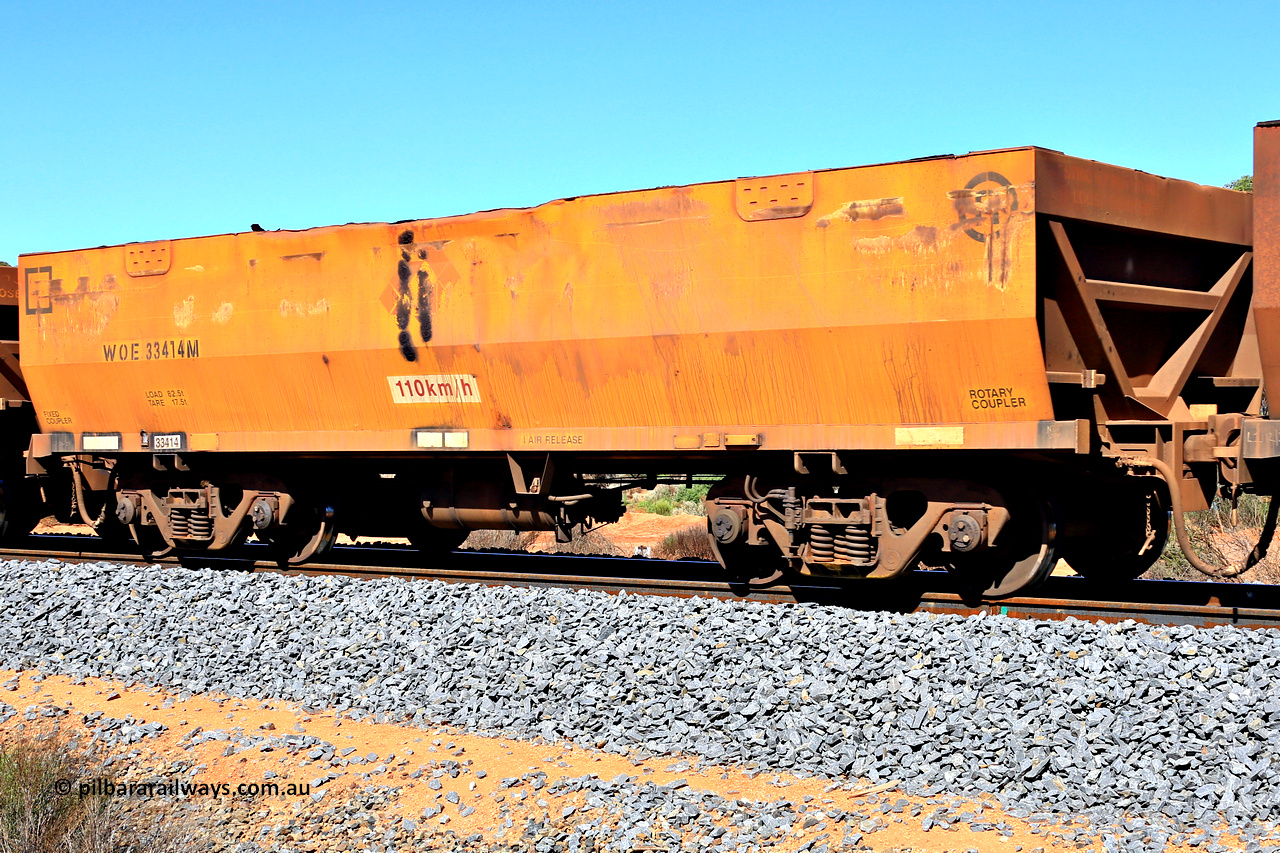 240328 2954
WOE type iron ore waggon WOE 33414 is one of a batch of one hundred and forty one built by United Group Rail WA between November 2005 and April 2006 with serial number 950142-119 and a build date of 04/2006 with a revised load of 82.5 tonnes and was fleet number 8913. It has had the sides repainted Aurizon yellow and logo just visible. Mineral Resources traffic 5040 empty Mount Walton iron ore train. 28th March 2024.
Keywords: WOE-type;WOE33414;United-Group-Rail-WA;950142-119;