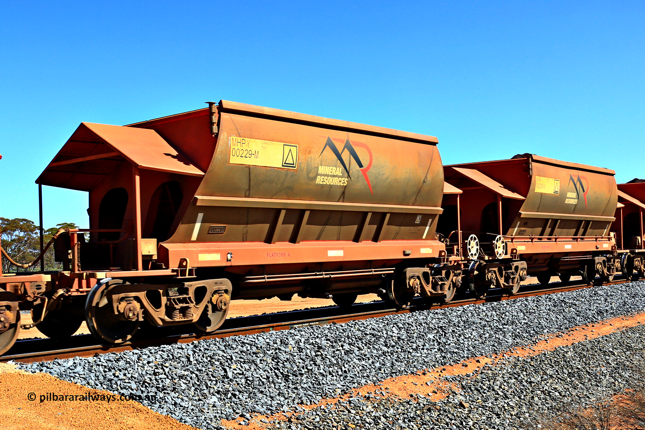 240328 3012
Loaded Koolyanobbing iron ore train 5041 with Mineral Resources Ltd MHPY type iron ore waggons MHPY 00229 and MHPY 00230 built by CSR Yangtze Co China with serial numbers 2014 / 382-229 and 2014 / 382-230 in 2014 as a batch of 382 pairs, these bottom discharge hopper waggons are operated in 'married' pairs. 28th of March 2024.
Keywords: MHPY-type;MHPY00229;2014/382-229;MHPY00230;2014/382-230;CSR-Yangtze-Rolling-Stock-Co-China;