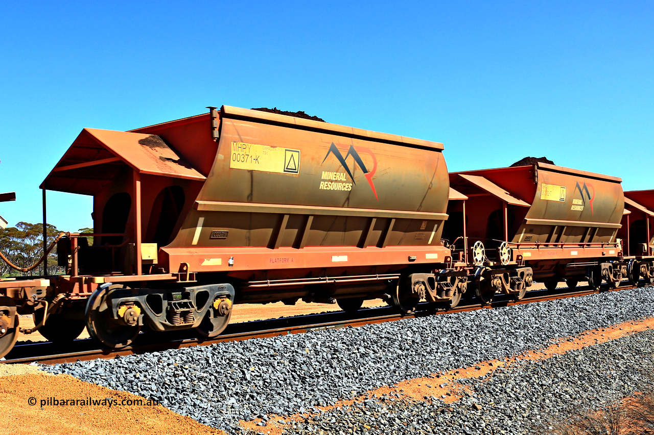 240328 3014
Loaded Koolyanobbing iron ore train 5041 with Mineral Resources Ltd MHPY type iron ore waggons MHPY 00371 and MHPY 00372 built by CSR Yangtze Co China with serial numbers 2014 / 382-371 and 2014 / 382-372 in 2014 as a batch of 382 pairs, these bottom discharge hopper waggons are operated in 'married' pairs. 28th of March 2024.
Keywords: MHPY-type;MHPY00371;2014/382-371;MHPY00372;2014/382-372;CSR-Yangtze-Rolling-Stock-Co-China;