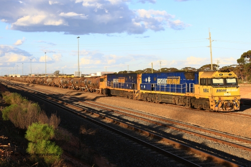 240328 3166
West Kalgoorlie yard and empty Pacific National fuel train 5445 for Viva Energy to Esperance waits for departure time. NR 4 and NR 113 lead thirty-one waggons for 705.7 tonnes and 607.4 metres. Thursday March 28, 2024.
Consist was NTAY 6128 M, NTAY 6131 D, NTBF 6121 Y, ATPF 584 S, NTBF 6118 A, NTBF 6122 A, ATLF 562 S, NTAY 6132 M, ATPF 579 J, ATPF 607 L, ATLF 561 J, NTAY 6130 R, ATPF 576 F, NTBF 6119 J, ATQF 611 Y, ATPF 606 C, ATMF 552 N, ATPF 582 A, ATPF 574 K, ATPF 581 Y, ATQF 612 A, ATPF 573 B, ATPF 580 F, ATPF 575 T, ATPF 571 G, NTAY 6126 R, ATPF 577 Y, ATPF 572 P, NTBF 6120 F, NTAY 6129 V, ATMF 551 E.
Keywords: NR-class;NR4;Goninan-NSW;GE;Cv40-9i;7250-11/96-206;