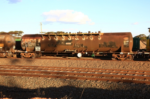 240328 3176
West Kalgoorlie, Viva Energy's NTBF type fuel tank waggon NTBF 6122, with former owners name (Freight Australia) visible. NTBF 6122 was built by Comeng NSW in 1975 as a bitumen tanker, type SCA, for Shell Bitumen NSW as SCA 273. Fitted with conventional couplers in Pacific National's train 5445 empty fuel to Esperance. March 28, 2024.
Keywords: NTBF-type;NTBF6122;Comeng-NSW;SCA-type;SCA273;