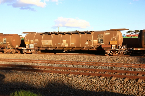 240328 3184
West Kalgoorlie, Viva Energy's APTF type fuel tank waggon ATPF 576 built by WAGR Midland Workshops in 1974 for Shell, in a batch of nine, as a WJP type 80,660 litre, one compartment one dome tank waggon, with a SFL of 80,500 litres, fitted with type F InterLock couplers. Pacific National empty fuel train 5445 to Esperance. March 28, 2024.
Keywords: ATPF-type;ATPF576;WAGR-Midland-WS;WJP-type;