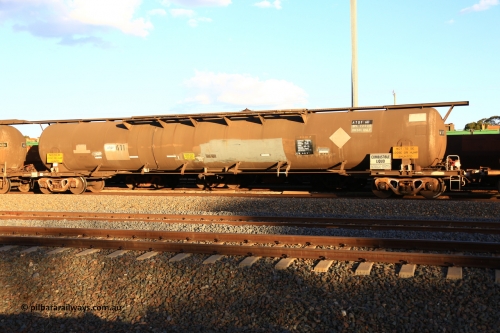 240328 3186
West Kalgoorlie, Viva Energy's ATQF type fuel tank waggon ATQF 611, built by Indeng Qld 1982, in a batch of two, for Shell as type WJQ, 79,340 litre, one compartment one dome, fitted with type F InterLock couplers. Indeng name still visible at far end. Safe fill level of 72,000 litres. Pacific National empty fuel train 5445 to Esperance. March 28, 2024.
Keywords: ATQF-type;ATQF611;Indeng-Qld;WJQ-type;