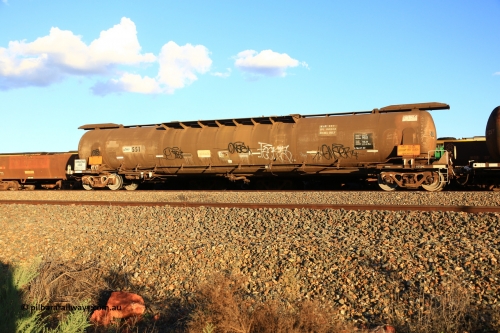 240328 3202
West Kalgoorlie, Viva Energy's ATMF type fuel tank waggon ATMF 551 is one of three built by Tulloch Limited NSW as the WJM type in 1971 with a capacity of 96,250 litres with one compartment and one dome, current Safe Fill Level [SFL] capacity of 80,500 litres, fitted with type E coupler. WJM's 551 and 552 built for Shell and 553 built for BP Oil. Pacific National's 5445 empty fuel train to Esperance. March 28.2024.
Keywords: ATMF-type;ATMF551;Tulloch-Ltd-NSW;WJM-type;