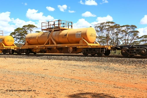 240328 3103
Hampton Ballast Siding, Watco's 5WS4 loaded acid transfer train with 57' DQHY type flat waggon built by CRRC, China in 2022 as a batch of sixty for Watco to carry the CSA acid tanks, DQHY 13024 with CSA-0098 acid tank. March 28, 2024.
Keywords: DQHY-type;DQHY13024;CRRC-China;