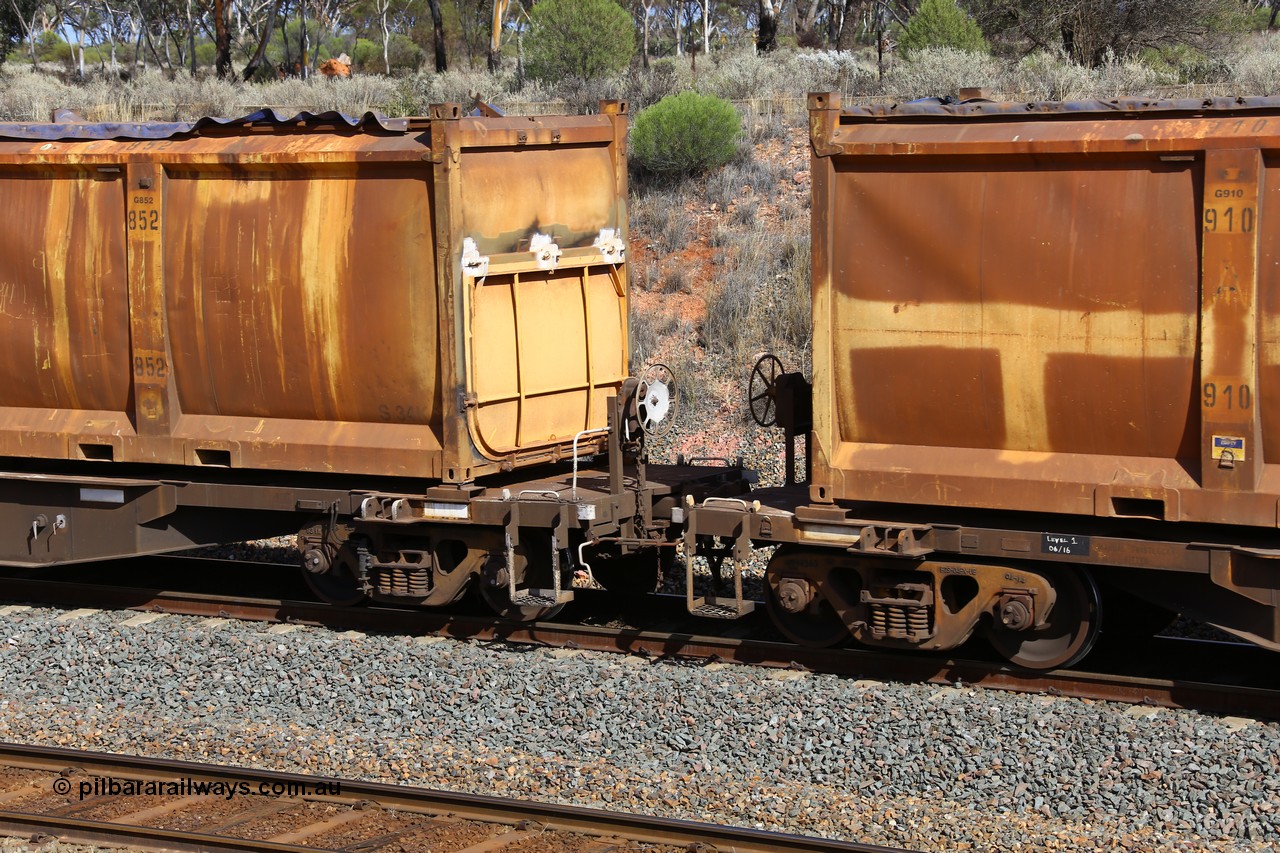 161112 2991
West Kalgoorlie, loaded Malcolm sulphur train 6029, AQNY type waggon AQNY 32165 one of sixty two waggons built by Goninan WA in 1998 as WQN type for Murrin Murrin container traffic, detail view of handbrake end and door detail on sulphur container S34K G852.
Keywords: AQNY-type;AQNY32165;Goninan-WA;WQN-type;