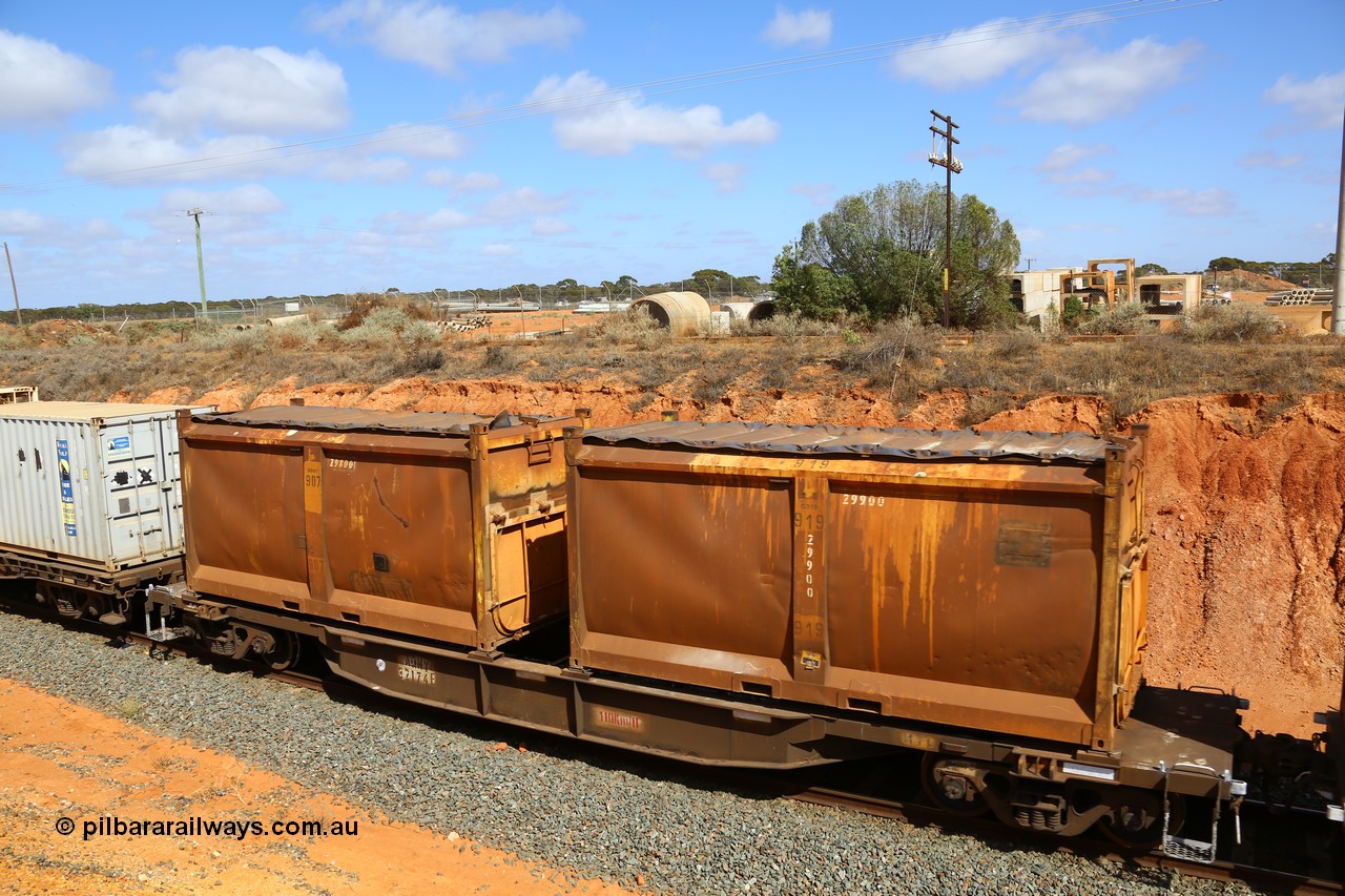161112 3034
West Kalgoorlie, loaded Malcolm sulphur train 6029, AQNY type waggon AQNY 32174 one of sixty two waggons built by Goninan WA in 1998 as WQN type for Murrin Murrin container traffic with a pair of original style sulphur containers with sliding tarpaulins, S144C G919 and S17V G907.
Keywords: AQNY-type;AQNY32174;Goninan-WA;WQN-type;