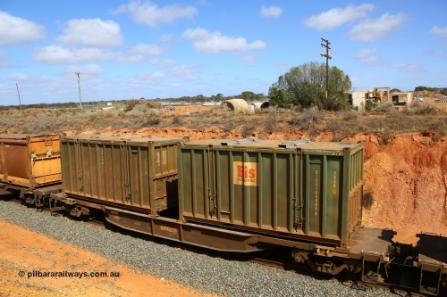 161112 3028
West Kalgoorlie, loaded Malcolm sulphur train 6029, AQNY type waggon AQNY 32212, final member of sixty two waggons built by Goninan WA in 1998 as WQN type for Murrin Murrin container traffic with a pair of Bis Industries hard-top type 25U0 containers BISU 100096 and un-decaled BISU 100019.
Keywords: AQNY-type;AQNY32212;Goninan-WA;WQN-type;