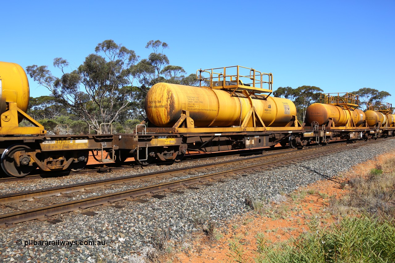 161112 3450
Binduli, loaded Hampton acid train 7406 with AQHY 30089 with sulphuric acid tank CSA 0085, originally built by the WAGR Midland Workshops in 1964/66 as a WF type flat waggon, then in 1997, following several recodes and modifications, was one of seventy five waggons converted to the WQH type to carry CSA sulphuric acid tanks between Hampton/Kalgoorlie and Perth/Kwinana. CSA 0085 was built by Acid Plant Management Services, WA.
Keywords: AQHY-type;AQHY30089;WAGR-Midland-WS;WF-type;WFDY-type;WFDF-type;RFDF-type;WQH-type;