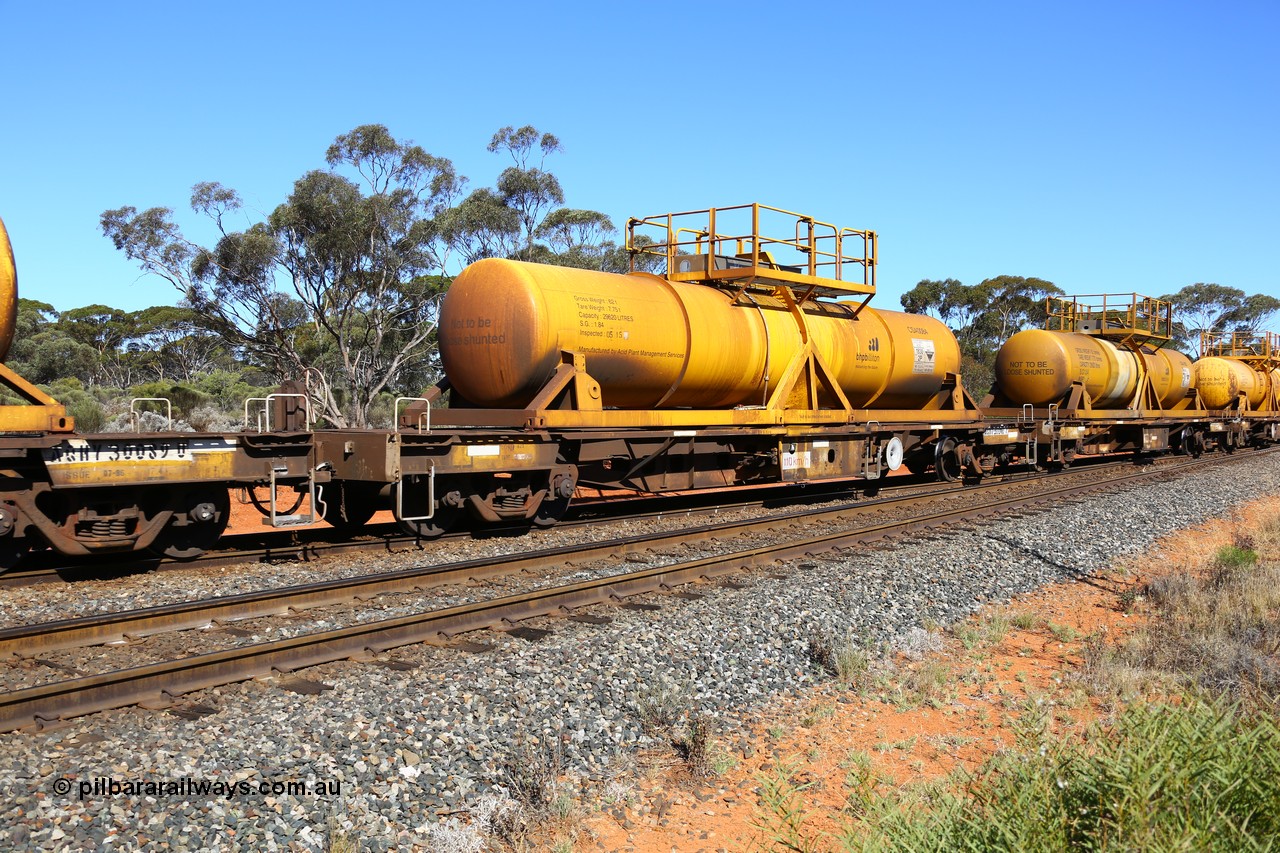 161112 3451
Binduli, loaded Hampton acid train 7406 with AQHY 30060 with sulphuric acid tank CSA 0084, originally built by the WAGR Midland Workshops in 1964/66 as a WF type flat waggon, then in 1997, following several recodes and modifications, was one of seventy five waggons converted to the WQH type to carry CSA sulphuric acid tanks between Hampton/Kalgoorlie and Perth/Kwinana. CSA 0084 was built by Acid Plant Management Services, WA.
Keywords: AQHY-type;AQHY30060;WAGR-Midland-WS;WF-type;WFL-type;WFDY-type;WFDF-type;RFDF-type;WQH-type;