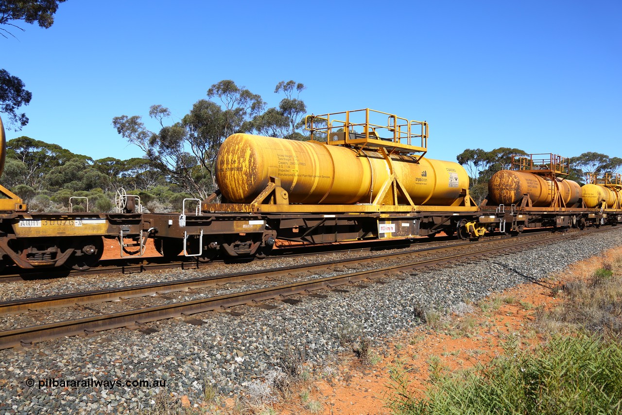 161112 3454
Binduli, loaded Hampton acid train 7406 with AQHY 30056 with sulphuric acid tank CSA 0083, originally built by the WAGR Midland Workshops in 1964/66 as a WF type flat waggon, then in 1997, following several recodes and modifications, was one of seventy five waggons converted to the WQH type to carry CSA sulphuric acid tanks between Hampton/Kalgoorlie and Perth/Kwinana. CSA 0083 was built by Acid Plant Management Services, WA.
Keywords: AQHY-type;AQHY30056;WAGR-Midland-WS;WF-type;WFDY-type;WFDF-type;RFDF-type;WQH-type;