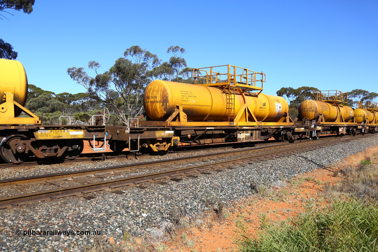 161112 3457
Binduli, loaded Hampton acid train 7406 with AQHY 30078 with sulphuric acid tank CSA 0082, originally built by the WAGR Midland Workshops in 1964/66 as a WF type flat waggon, then in 1997, following several recodes and modifications, was one of seventy five waggons converted to the WQH type to carry CSA sulphuric acid tanks between Hampton/Kalgoorlie and Perth/Kwinana. CSA 0082 was built by Acid Plant Management Services, WA.
Keywords: AQHY-type;AQHY30078;WAGR-Midland-WS;WF-type;WFDY-type;WFDF-type;RFDF-type;WQH-type;