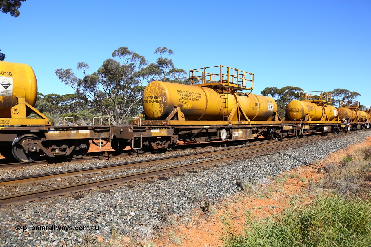 161112 3461
Binduli, loaded Hampton acid train 7406 with AQHY 30034 with sulphuric acid tank CSA 0136, originally built by the WAGR Midland Workshops in 1964/66 as a WF type flat waggon, then in 1997, following several recodes and modifications, was one of seventy five waggons converted to the WQH type to carry CSA sulphuric acid tanks between Hampton/Kalgoorlie and Perth/Kwinana. CSA 0136 was built by Vcare Engineering, India for Access Petrotec & Mining Solutions.
Keywords: AQHY-type;AQHY30034;WAGR-Midland-WS;WF-type;WFDY-type;WFDF-type;RFDF-type;WQH-type;