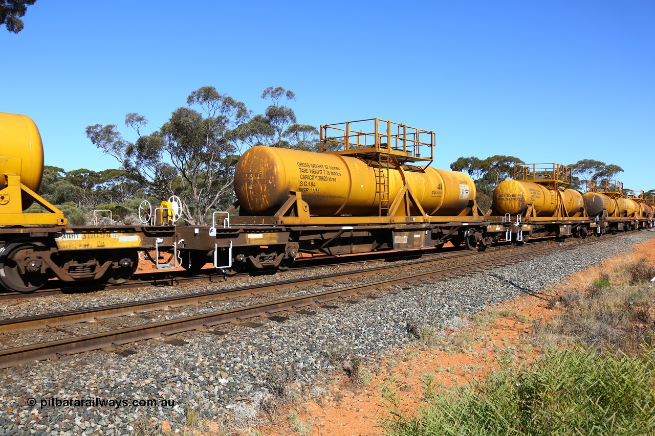 161112 3463
Binduli, loaded Hampton acid train 7406 with AQHY 30006 with sulphuric acid tank CSA 0131, originally built by the WAGR Midland Workshops in 1964/66 as a WF type flat waggon, then in 1997, following several recodes and modifications, was one of seventy five waggons converted to the WQH type to carry CSA sulphuric acid tanks between Hampton/Kalgoorlie and Perth/Kwinana. CSA 0131 was built by Vcare Engineering, India for Access Petrotec & Mining Solutions.
Keywords: AQHY-type;AQHY30006;WAGR-Midland-WS;WF-type;WMA-type;WFDY-type;WFDF-type;RFDF-type;WQH-type;