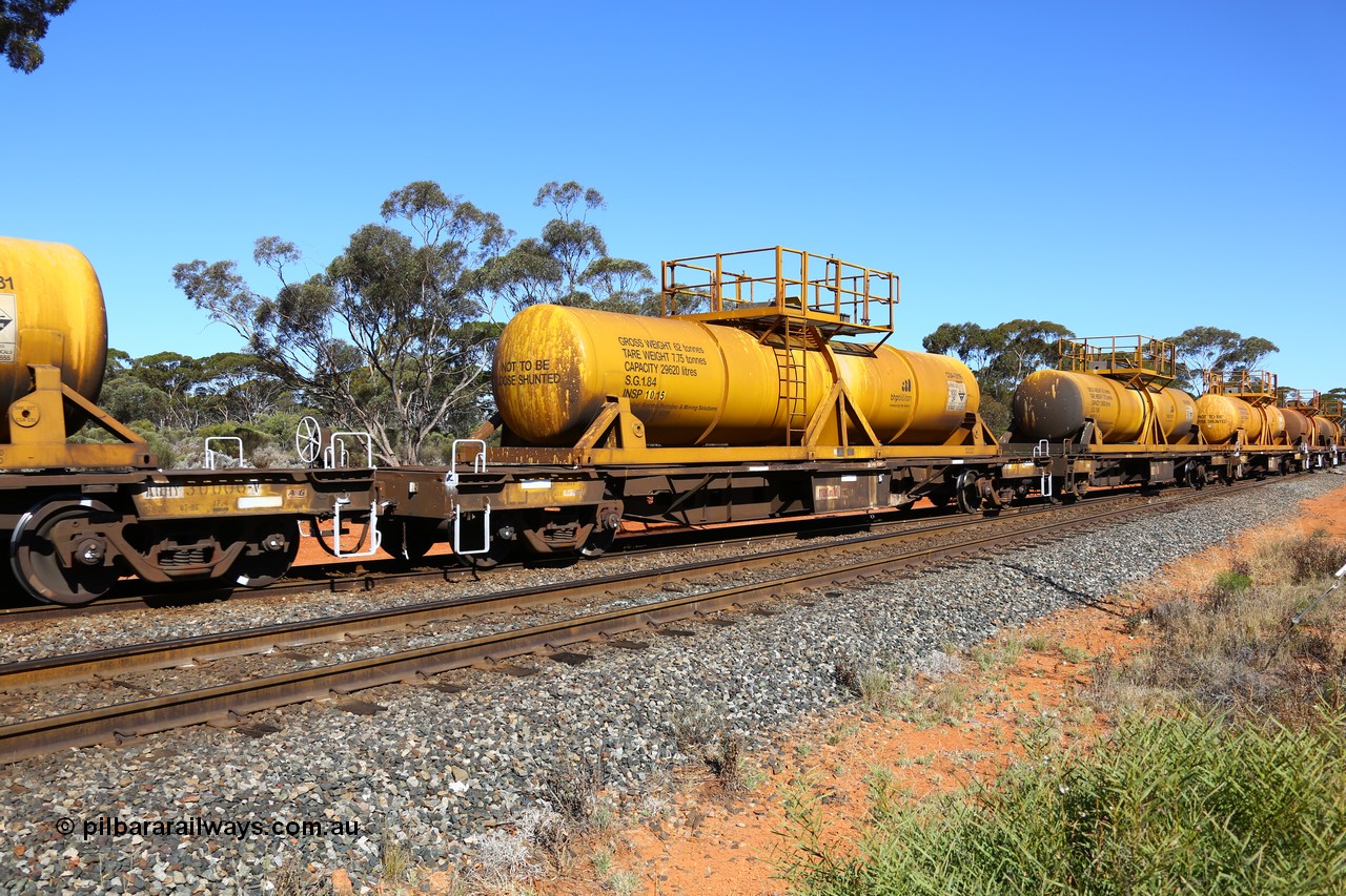 161112 3464
Binduli, loaded Hampton acid train 7406 with AQHY 30077 with sulphuric acid tank CSA 0116, originally built by the WAGR Midland Workshops in 1964/66 as a WF type flat waggon, then in 1997, following several recodes and modifications, was one of seventy five waggons converted to the WQH type to carry CSA sulphuric acid tanks between Hampton/Kalgoorlie and Perth/Kwinana. CSA 0116 was built by Vcare Engineering, India for Access Petrotec & Mining Solutions.
Keywords: AQHY-type;AQHY30077;WAGR-Midland-WS;WF-type;WFDY-type;WFDF-type;RFDF-type;WQH-type;