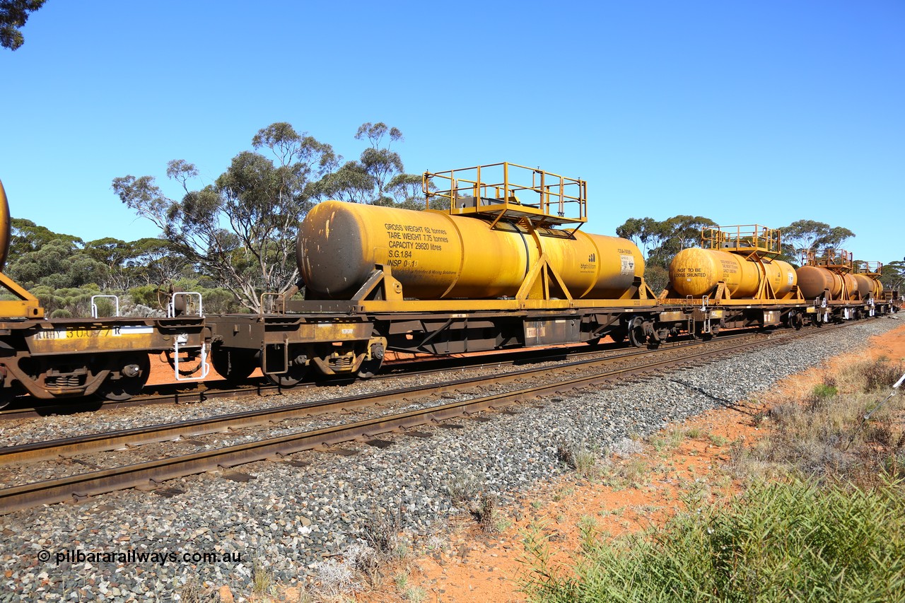 161112 3465
Binduli, loaded Hampton acid train 7406 with AQHY 30055 with sulphuric acid tank CSA 0090, originally built by the WAGR Midland Workshops in 1964/66 as a WF type flat waggon, then in 1997, following several recodes and modifications, was one of seventy five waggons converted to the WQH type to carry CSA sulphuric acid tanks between Hampton/Kalgoorlie and Perth/Kwinana. CSA 0090 was built by Vcare Engineering, India for Access Petrotec & Mining Solutions.
Keywords: AQHY-type;AQHY30055;WAGR-Midland-WS;WF-type;WFW-type;WFDY-type;WFDF-type;RFDF-type;WQH-type;