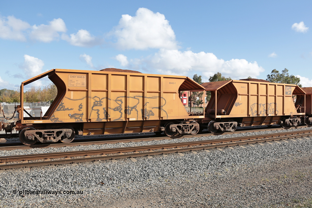 140601 4619
Midland, loaded iron ore train #1030 heading to Kwinana, CFCLA leased CHEY type waggon CHEY 8045 one pair of 120 bar coupled pairs built by Bluebird Rail Operations SA in 2011-12. 1st June 2014.
Keywords: CHEY-type;CHEY8045;Bluebird-Rail-Operations-SA;2011/120-45;