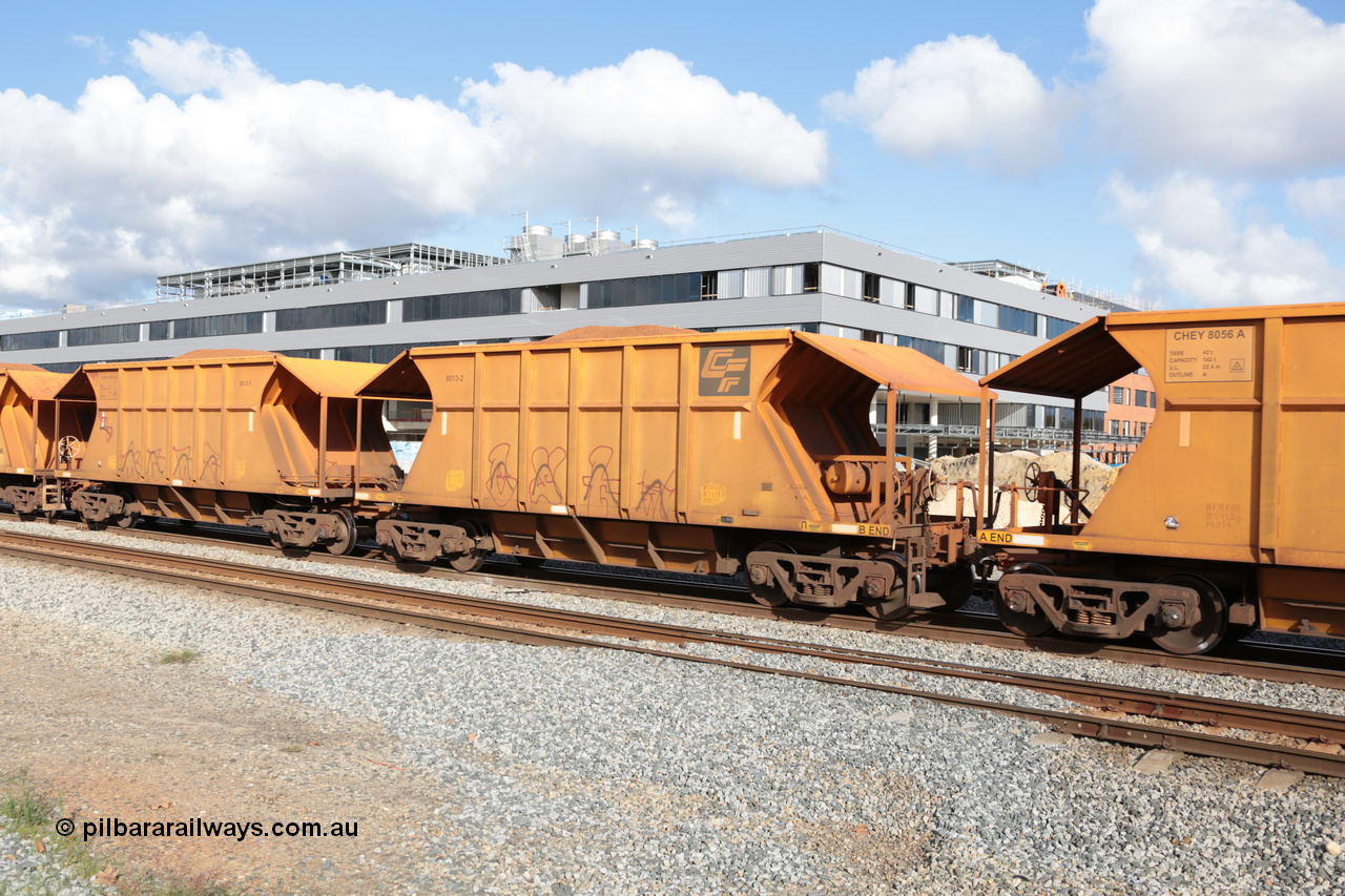 140601 4628
Midland, loaded iron ore train #1030 heading to Kwinana, CFCLA leased CHEY type waggon CHEY 8013 one pair of 120 bar coupled pairs built by Bluebird Rail Operations SA in 2011-12. 1st June 2014.
Keywords: CHEY-type;CHEY8013;Bluebird-Rail-Operations-SA;2011/120-13;